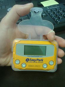 An example of an in-vehicle parking meter, the EasyPark device by On Track Innovations.