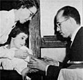 Salk administering the polio vaccine