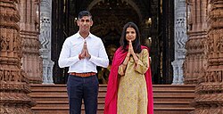 Rishi Sunak, the Prime Minister of the United Kingdom, and his wife Akshata Murty, with Namaste greetings, at Akshardham Temple, Delhi