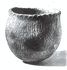 Pottery vessel with exterior lip impressed