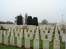 Tyne Cot Cemetery with "Cross of Sacrifice" on the far right