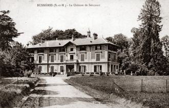 Exterior of large country house in extensive grounds