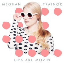 A white portrait dotted with pink shapes featuring a young blonde-haired woman pouting and posing with her right-hand holding her circular sunglasses. She wears a ponytail and long-sleeved white top covered in black lip motifs. At the top of the portrait in capital-letter font stands the name, Meghan Trainor, while at the bottom stands the title "Lips Are Movin".